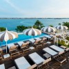ICONIC PAGODA segments umbrella, Crema Outdoor